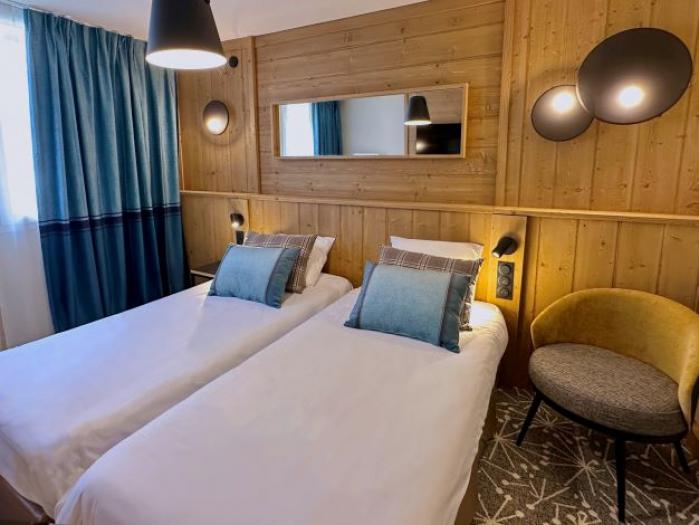 Chambre Confort 4 personnes côté piste Chambre Confort 4 personnes côté piste